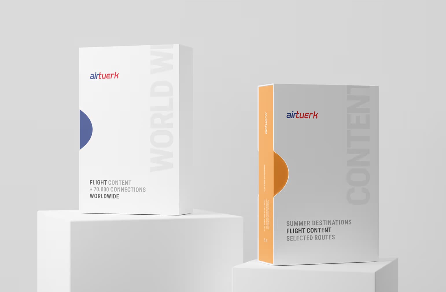 Two airtuerk flight content packages standing on white plinths, one white with the wordmark and the line flight content plus 70,000 connections worldwide, one orange labelled summer destinations, selected routes