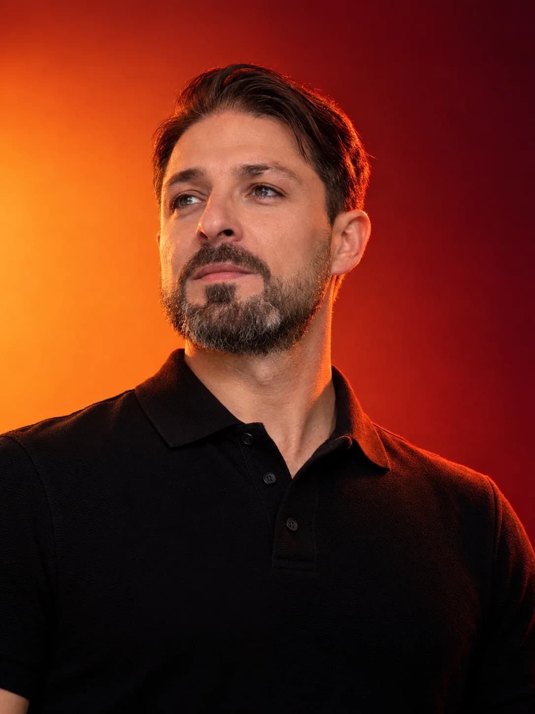 Portrait of Buhara Demir in warm orange light