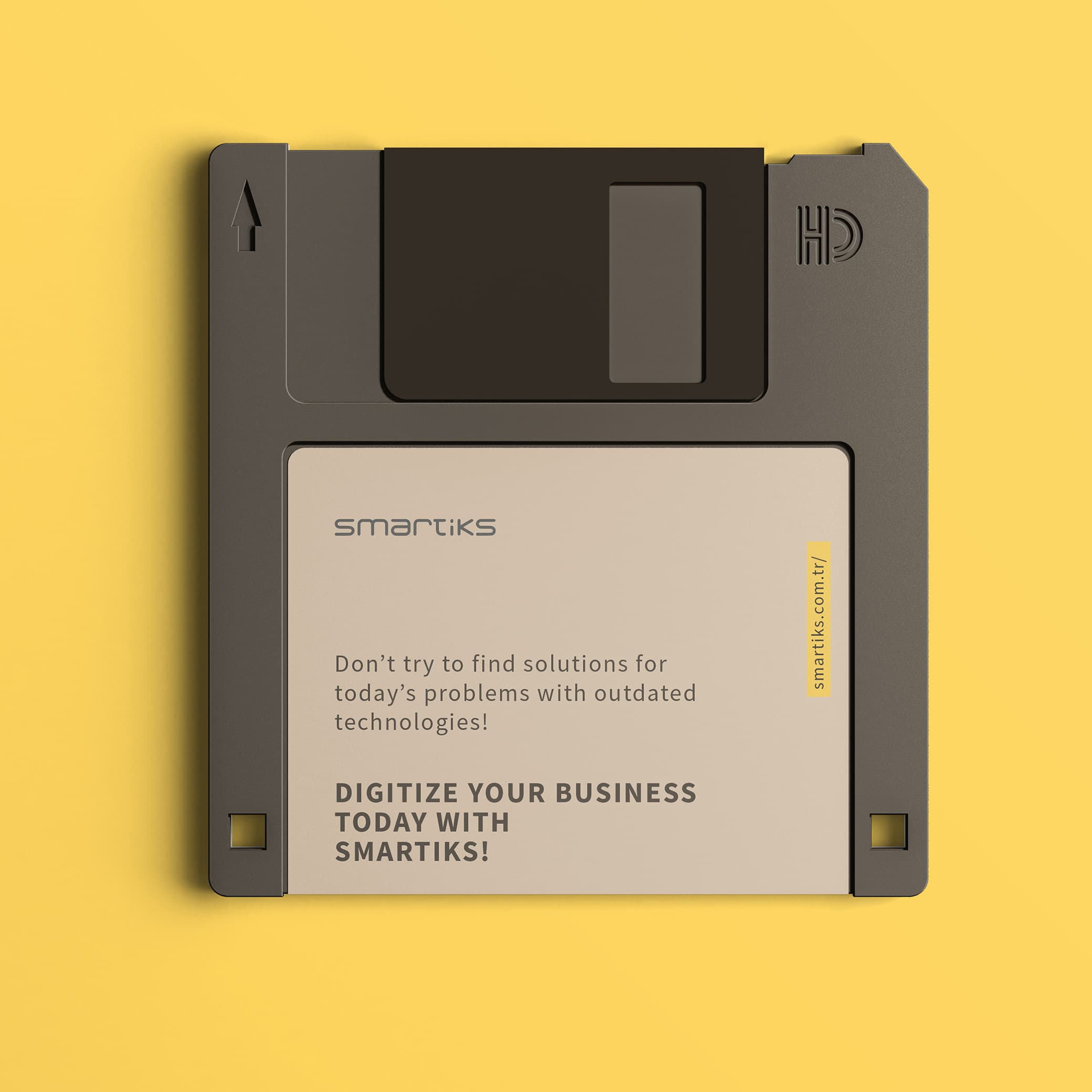 A three and a half inch floppy disk rendered on a yellow background, labelled do not try to find solutions for today's problems with outdated technologies, digitize your business today with Smartiks